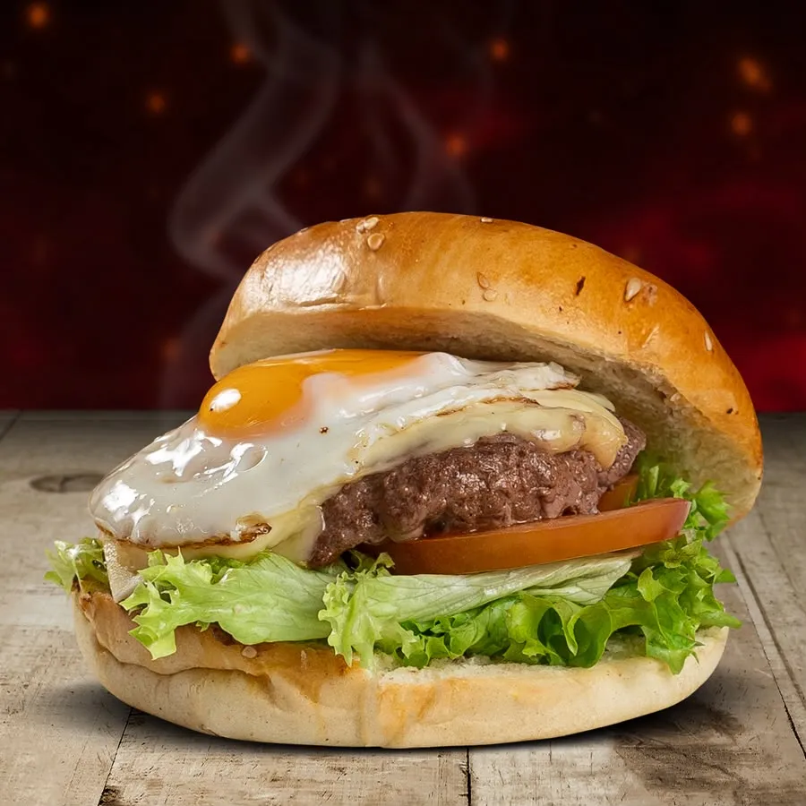 Hamburguesa con queso, huevo, lechuga y tomate